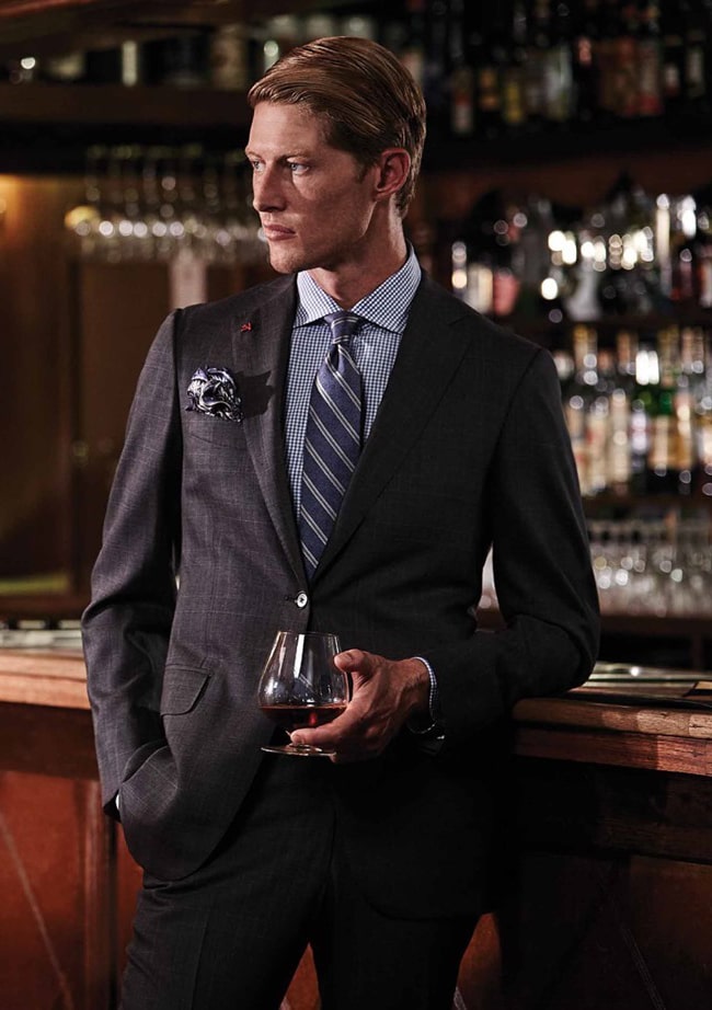A suited man in the Henry Bucks store